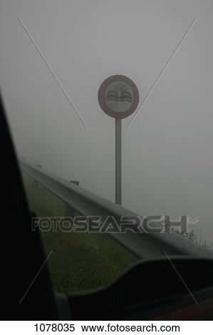 View of a road sign from a car window View Large Photo Image Stock Photography - View of a road sign from a car window. Fotosearch
