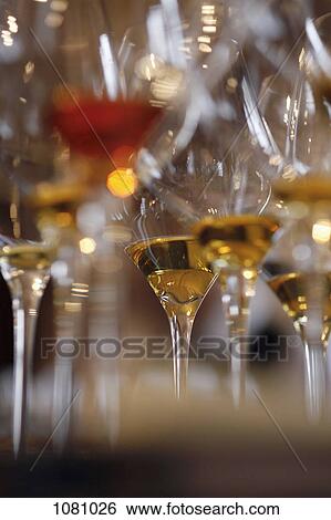 Wine glasses on table laid out for wine tasting View Large Photo Image Stock Photograph - Wine glasses on table laid out for wine tasting. Fotosearch