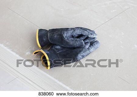 Work gloves on top of each other View Large Photo Image Stock Image - Work gloves on top of each other . Fotosearch