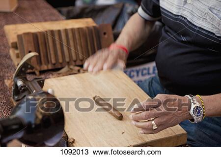 Worker at cigar factory View Large Photo Image Stock Image - Worker at cigar factory. Fotosearch