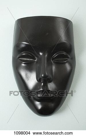 A black mask, female likeness View Large Photo Image Picture - A black mask, female likeness. Fotosearch