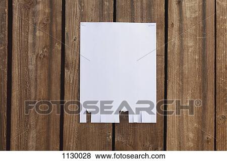 A blank flyer hanging on a wooden fence View Large Photo Image Stock Photo - A blank flyer hanging on a wooden fence. Fotosearch