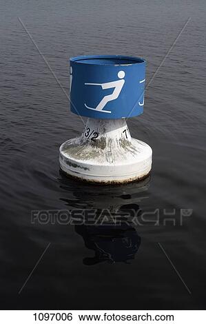 A buoy with a symbol for waterskiing on a lake View Large Photo Image Stock Photograph - A buoy with a symbol for waterskiing on a lake. Fotosearch