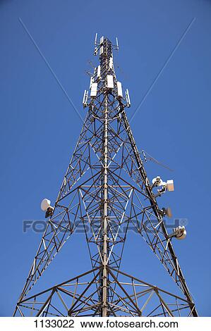 A communications tower, low angle view View Large Photo Image Stock Image - A communications tower, low angle view. Fotosearch