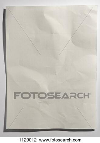 A crumpled sheet of paper View Large Photo Image Stock Image - A crumpled sheet of paper. Fotosearch