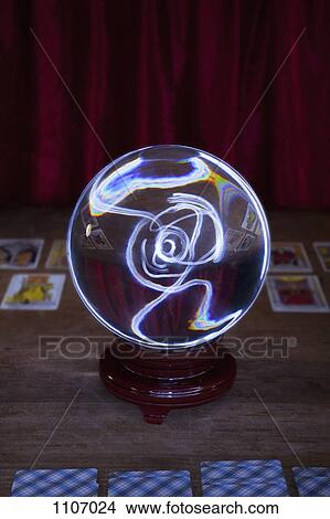 A crystal ball and tarot cards View Large Photo Image Picture - A crystal ball and tarot cards. Fotosearch