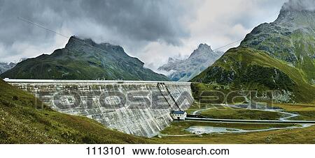Stock Image - A dam amongst the mountains of Tirol, Austria. Fotosearch