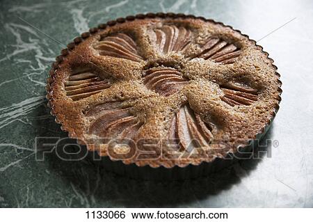 A freshly baked apple cake View Large Photo Image Stock Photograph - A freshly baked apple cake . Fotosearch