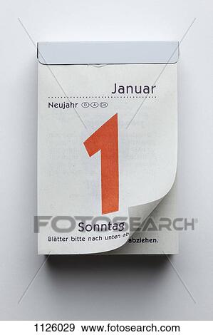 A German daily calendar showing New Year's Day with curled up page corner View Large Photo Image Stock Photo - A German daily calendar showing New Year's Day with curled up page corner. Fotosearch