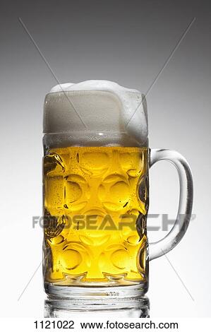 A glass mug of beer View Large Photo Image Stock Image - A glass mug of beer. Fotosearch