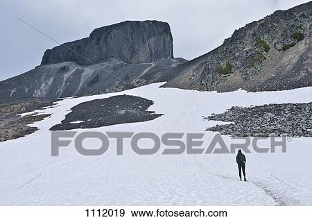 A hiker on Black Tusk, Garibaldi Park, British Columbia, Canada View Large Photo Image Stock Photo - A hiker on Black Tusk, Garibaldi Park, British Columbia, Canada. Fotosearch