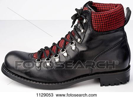A hiking boot View Large Photo Image Stock Image - A hiking boot. Fotosearch