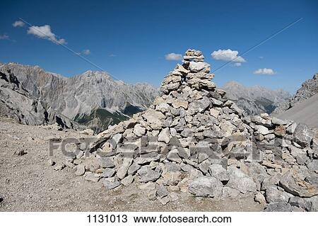 A large pile of rocks forming a cairn in the Wetterstein Mountains, Austria View Large Photo Image Stock Image - A large pile of rocks forming a cairn in the Wetterstein Mountains, Austria. Fotosearch