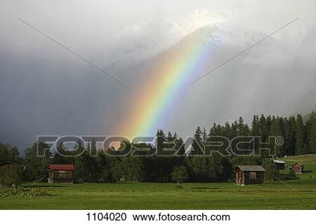 A rainbow in front of the Rhone Glacier, Valais Canton, Switzerland View Large Photo Image Stock Image - A rainbow in front of the Rhone Glacier, Valais Canton, Switzerland. Fotosearch
