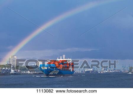 A rainbow over a shipping container in the Hamburg harbor View Large Photo Image Stock Image - A rainbow over a shipping container in the Hamburg harbor. Fotosearch