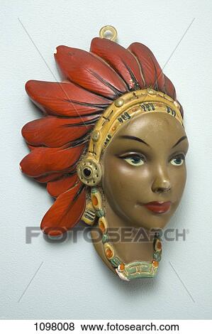 A retro female mannequin wall hanging, Native American motif View Large Photo Image Stock Photo - A retro female mannequin wall hanging, Native American motif. Fotosearch