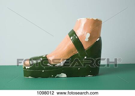 A retro female mannequin's foot wearing a sandal View Large Photo Image Stock Image - A retro female mannequin's foot wearing a sandal. Fotosearch