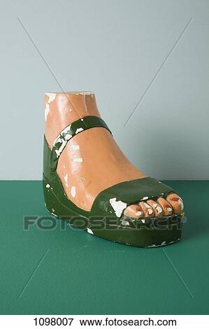 A retro female mannequin's foot wearing a sandal View Large Photo Image Stock Photo - A retro female mannequin's foot wearing a sandal. Fotosearch