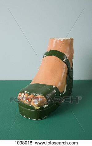 A retro female mannequin's foot wearing a sandal View Large Photo Image Stock Photography - A retro female mannequin's foot wearing a sandal. Fotosearch