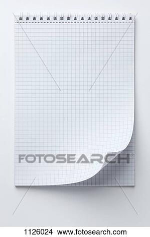 A spiral notepad with graph paper and a curled up page corner View Large Photo Image Picture - A spiral notepad with graph paper and a curled up page corner. Fotosearch