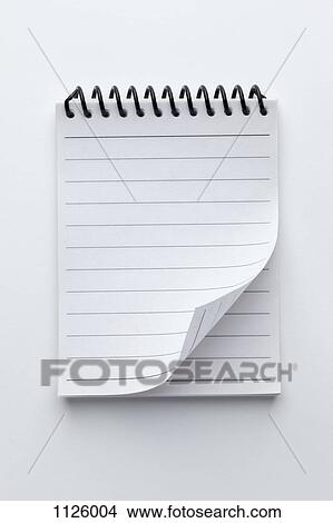 A spiral notepad with lined paper and a curled up page corner View Large Photo Image Picture - A spiral notepad with lined paper and a curled up page corner. Fotosearch