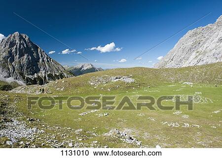 A valley in the Wetterstein Mountains, Austria View Large Photo Image Stock Image - A valley in the Wetterstein Mountains, Austria. Fotosearch