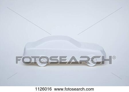 A white miniature model car on a white background View Large Photo Image Stock Photograph - A white miniature model car on a white background. Fotosearch