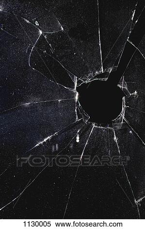 A window with a hole broken through the glass, night View Large Photo Image Stock Photography - A window with a hole broken through the glass, night. Fotosearch