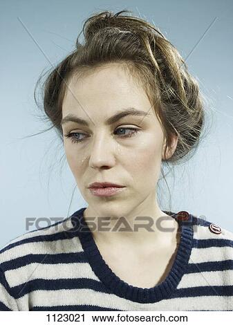 A woman with tears running down her face View Large Photo Image Stock Image - A woman with tears running down her face. Fotosearch