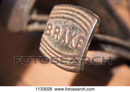 A worn, rusty pedal with BRAKE written on it in a land vehicle, close-up View Large Photo Image Stock Photo - A worn, rusty pedal with BRAKE written on it in a land vehicle, close-up. Fotosearch