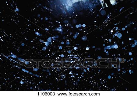 Abstract of multiple round drop shapes in mid-air View Large Photo Image Stock Image - Abstract of multiple round drop shapes in mid-air. Fotosearch