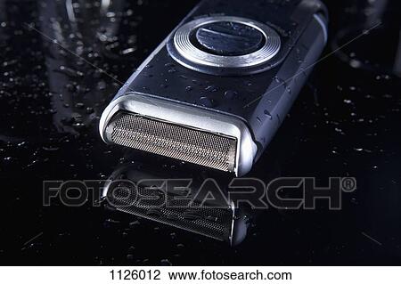 An elegant electric razor View Large Photo Image Stock Image - An elegant electric razor. Fotosearch
