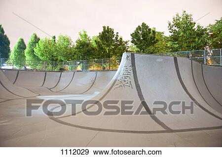An empty skateboard park View Large Photo Image Stock Photo - An empty skateboard park. Fotosearch