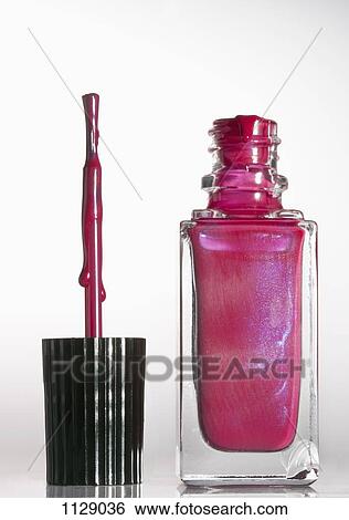 An open bottle of pink nail polish View Large Photo Image Stock Photograph - An open bottle of pink nail polish. Fotosearch
