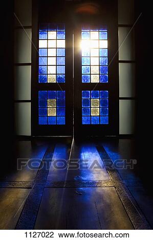 Blue color projected onto floor through stained glass door View Large Photo Image Stock Image - Blue color projected onto floor through stained glass door . Fotosearch