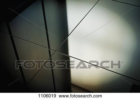Close-up spot lit reflection in gray toned mirrors View Large Photo Image Stock Photo - Close-up spot lit reflection in gray toned mirrors. Fotosearch