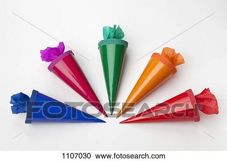 Cones filled with sweets arranged in a semi-circle View Large Photo Image Stock Image - Cones filled with sweets arranged in a semi-circle. Fotosearch