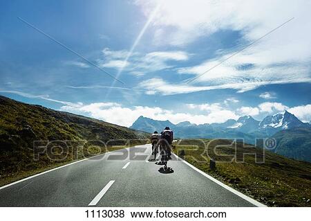 Cyclists on a mountain road, Tirol, Austria View Large Photo Image Stock Photo - Cyclists on a mountain road, Tirol, Austria. Fotosearch