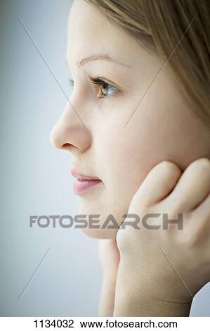 Daydreaming young woman View Large Photo Image Stock Image - Daydreaming young woman. Fotosearch