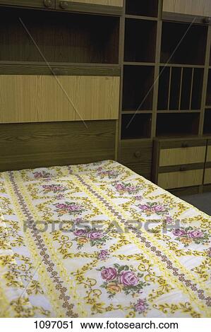 Stock Image - Detail of an old-fashioned bedroom. Fotosearch