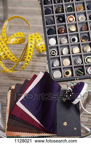 Detail of fabric samples, buttons, and other sewing equipment View Large Photo Image Stock Image - Detail of fabric samples, buttons, and other sewing equipment. Fotosearch