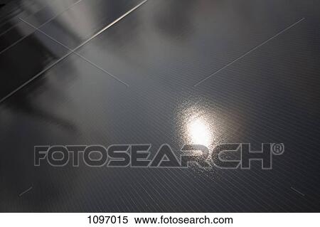 Stock Photography - Detail of solar panels in a row. Fotosearch