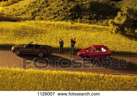 Stock Photo - Diorama of a toy car crash. Fotosearch