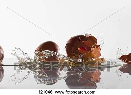 Eggs breaking View Large Photo Image Stock Photograph - Eggs breaking. Fotosearch