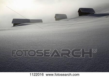 Four log cabins on smooth snowy landscape View Large Photo Image Stock Photograph - Four log cabins on smooth snowy landscape . Fotosearch