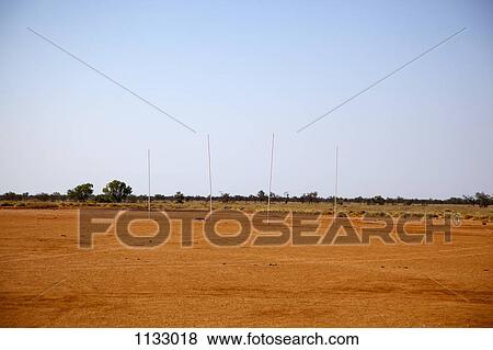 Four sticks stuck in ground, The Pilbara desert, Western Australia View Large Photo Image Stock Photo - Four sticks stuck in ground, The Pilbara desert, Western Australia. Fotosearch