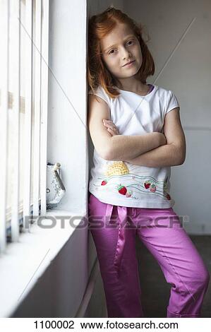 Girl leaning against wall View Large Photo Image Stock Image - Girl leaning against wall. Fotosearch