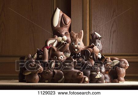 Heap of different chocolate Easter bunnies View Large Photo Image Stock Image - Heap of different chocolate Easter bunnies. Fotosearch