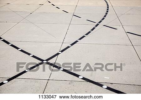 Lines on an airport runway View Large Photo Image Stock Photo - Lines on an airport runway. Fotosearch