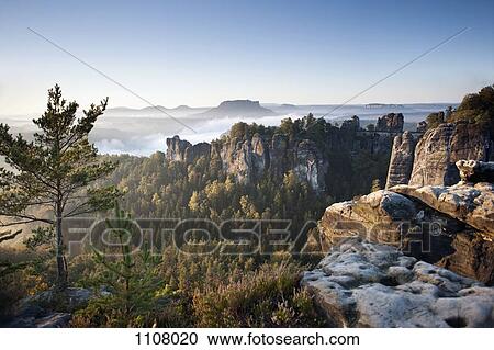 Morning at the Bastei, Elbe Sandstone Mountains, Saxon Switzerland National Park, Germany View Large Photo Image Stock Image - Morning at the Bastei, Elbe Sandstone Mountains, Saxon Switzerland National Park, Germany . Fotosearch